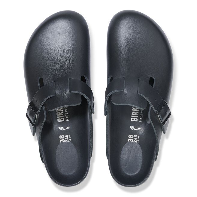 Black Birkenstock Boston clogs with adjustable strap, top view studio shot