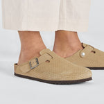 Birkenstock Boston clogs in dotted beige suede with silver buckle on model feet