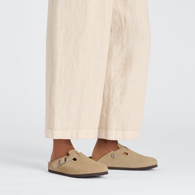 Birkenstock Boston clogs in dotted beige suede worn with cream pants