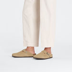 Birkenstock Boston clogs in dotted beige suede with embossed pattern worn with cream pants