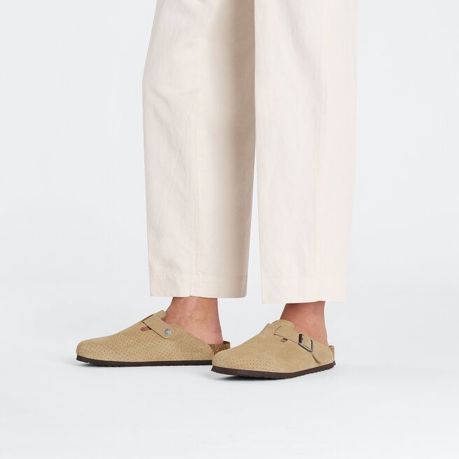 Birkenstock Boston clogs in dotted beige suede with embossed pattern worn with cream pants