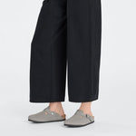 Birkenstock Boston suede clogs in dotted stone coin color on model's feet