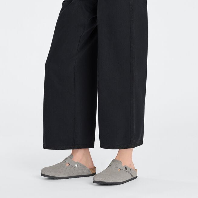 Birkenstock Boston suede clogs in dotted stone coin color on model's feet