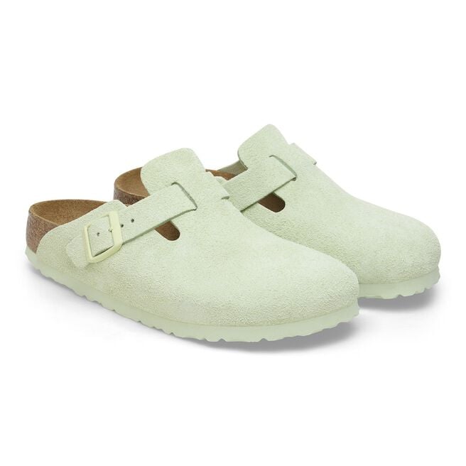 Birkenstock Boston clogs in faded lime green suede with adjustable buckle strap