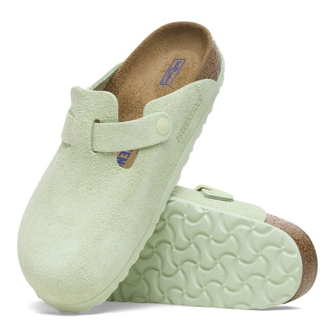 Birkenstock Boston clogs in faded lime green suede with cork footbed