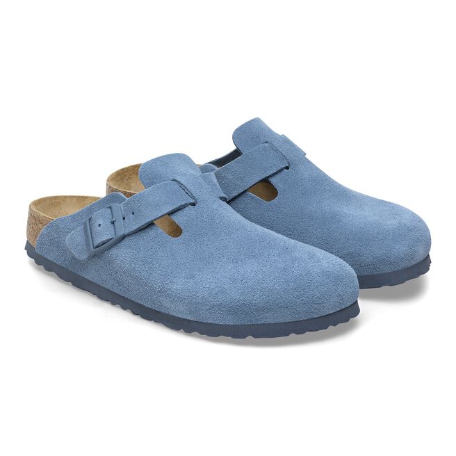 Birkenstock Boston clogs in light blue suede with adjustable buckle strap