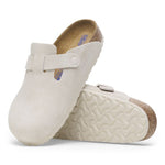 Birkenstock Boston clogs in antique white suede with adjustable strap and cork footbed