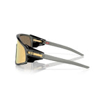 Oakley Latch Panel sunglasses with black frame, grey temples and gold Prizm lenses