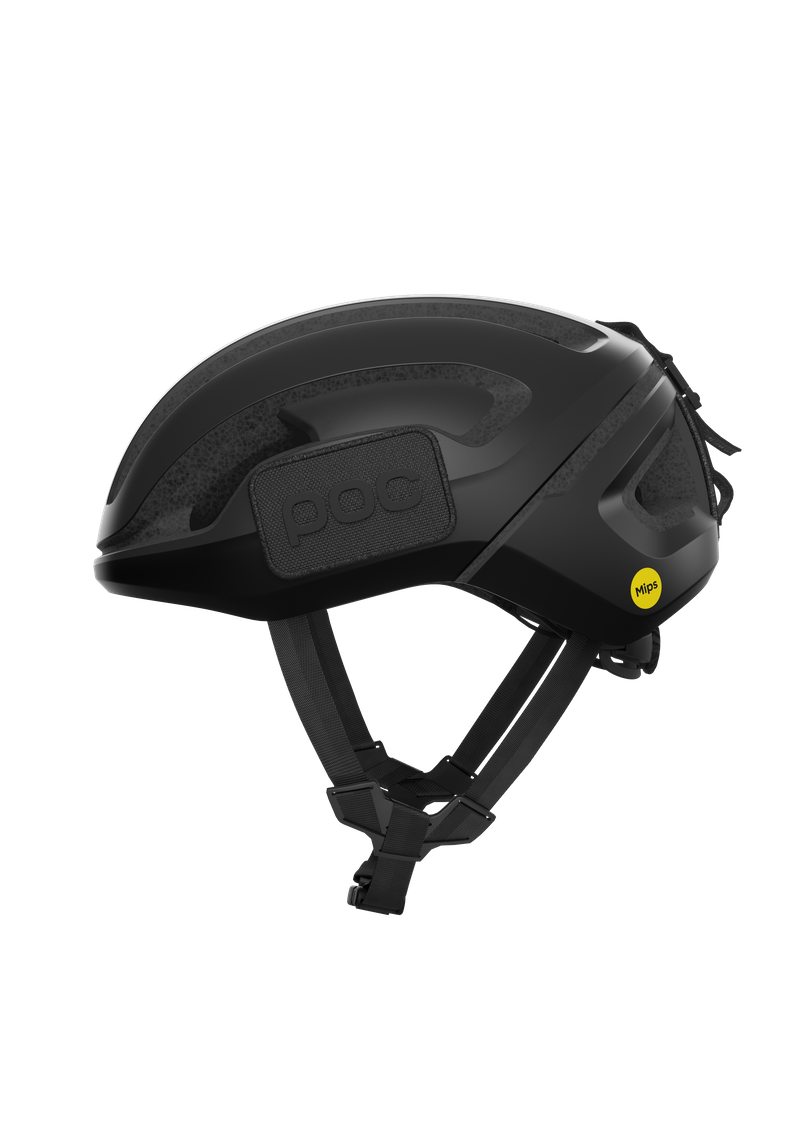 POC Omne Ultra MIPS cycling helmet in matte black with professional studio lighting