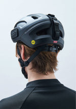 POC Omne Ultra MIPS bike helmet in uranium black matte worn by model