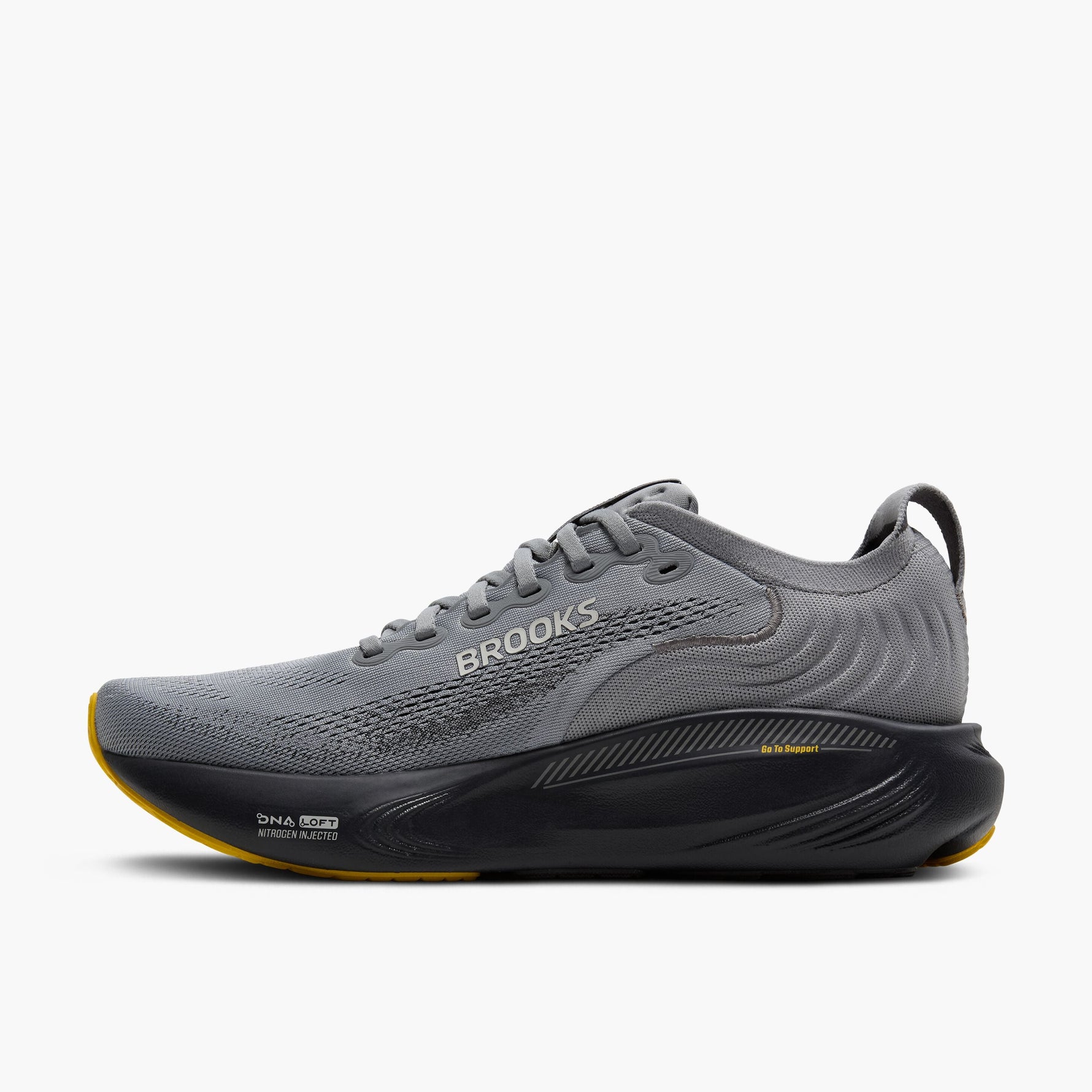 Brooks Adrenaline GTS 25 men's running shoe in primer grey with black midsole and yellow accents