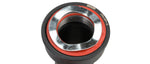 Angled close-up of SRAM GXP BB86 bottom bracket showing polished bearing outer race and red seal