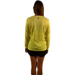 Woman modeling Legg One More Mile yellow long sleeve athletic shirt from behind