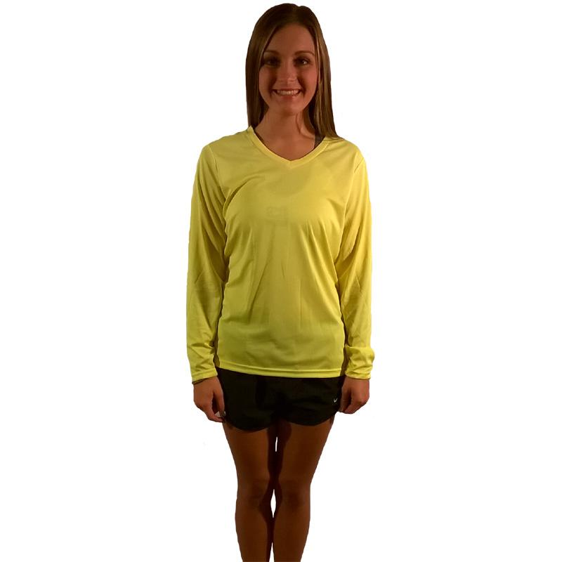 Woman wearing Legg One More Mile yellow long sleeve v-neck athletic shirt with black shorts