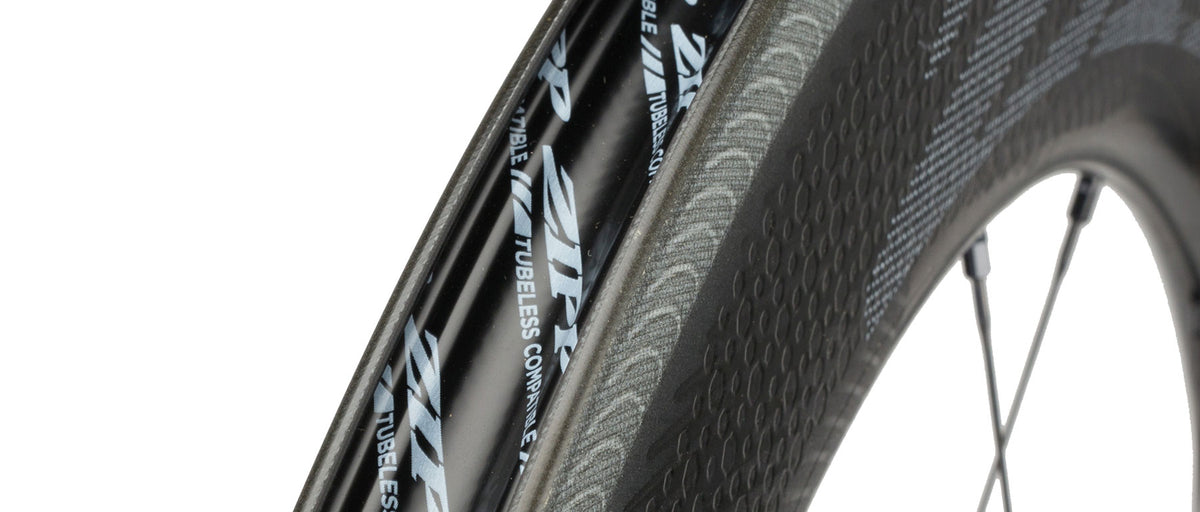 Zipp 808 NSW Carbon Tubeless Disc Wheel close-up showing carbon rim and tire detail