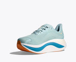 Hoka Skyward X running shoe in light green with blue carbon plate sole