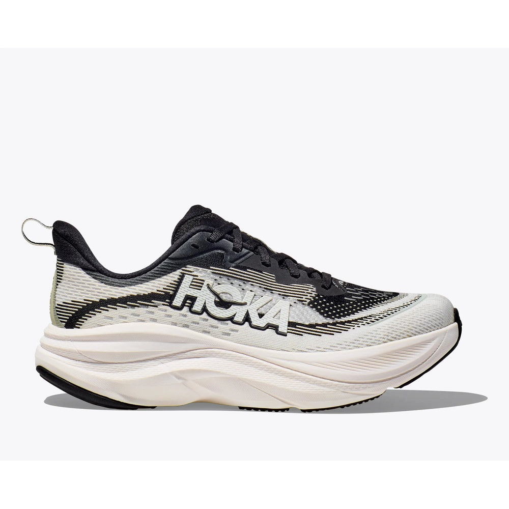 Hoka Skyflow women's running shoe in black and white colorway, side profile view