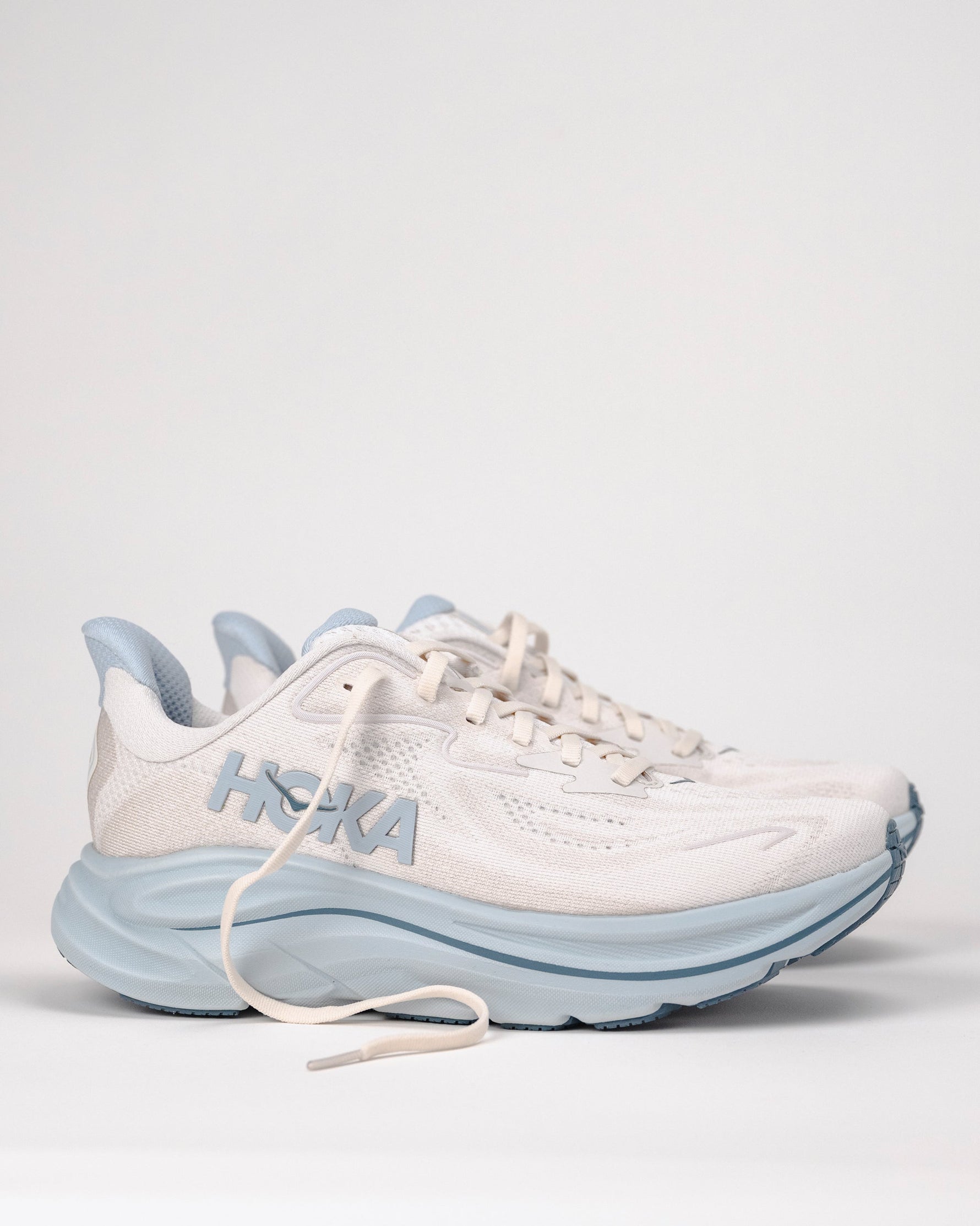 Hoka Clifton 10 women's running shoe in grout and mineral blue colorway