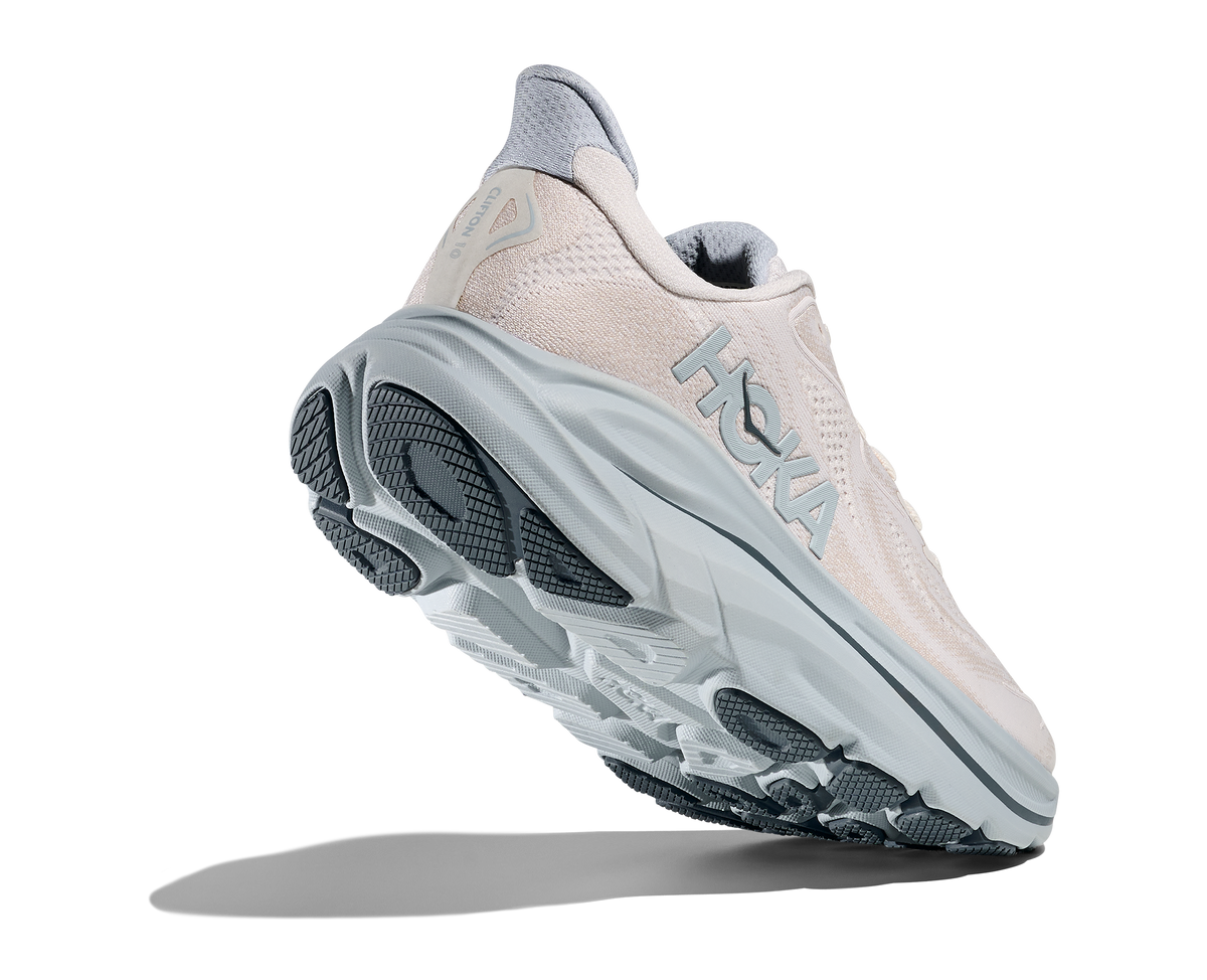HOKA Clifton 10 women's shoe angled sole view showing outsole traction pattern and midsole cushioning