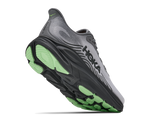 Close-up bottom angle of HOKA Clifton 11 showing green and black outsole tread pattern