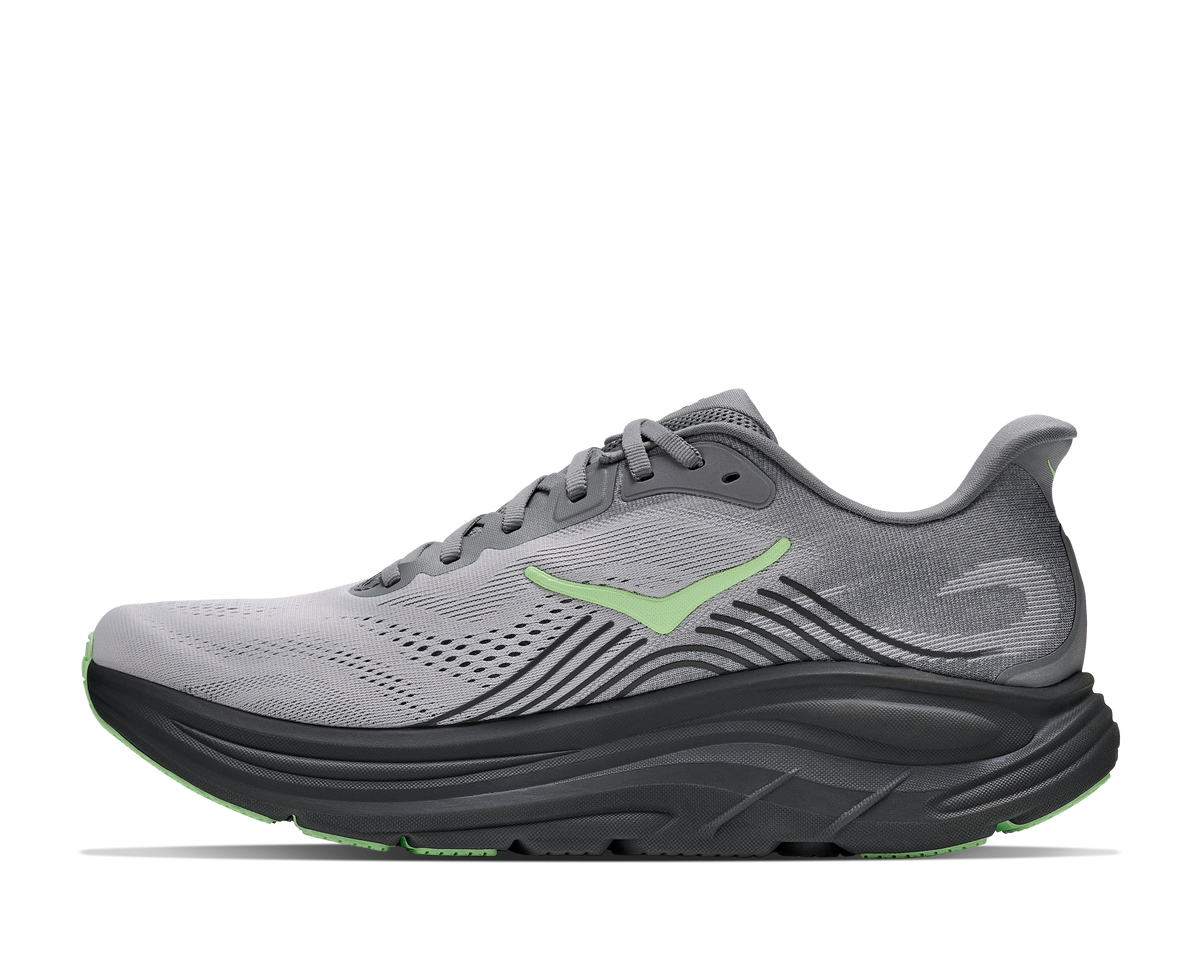HOKA Clifton 11 running shoe medial side view in grey with green outsole accent