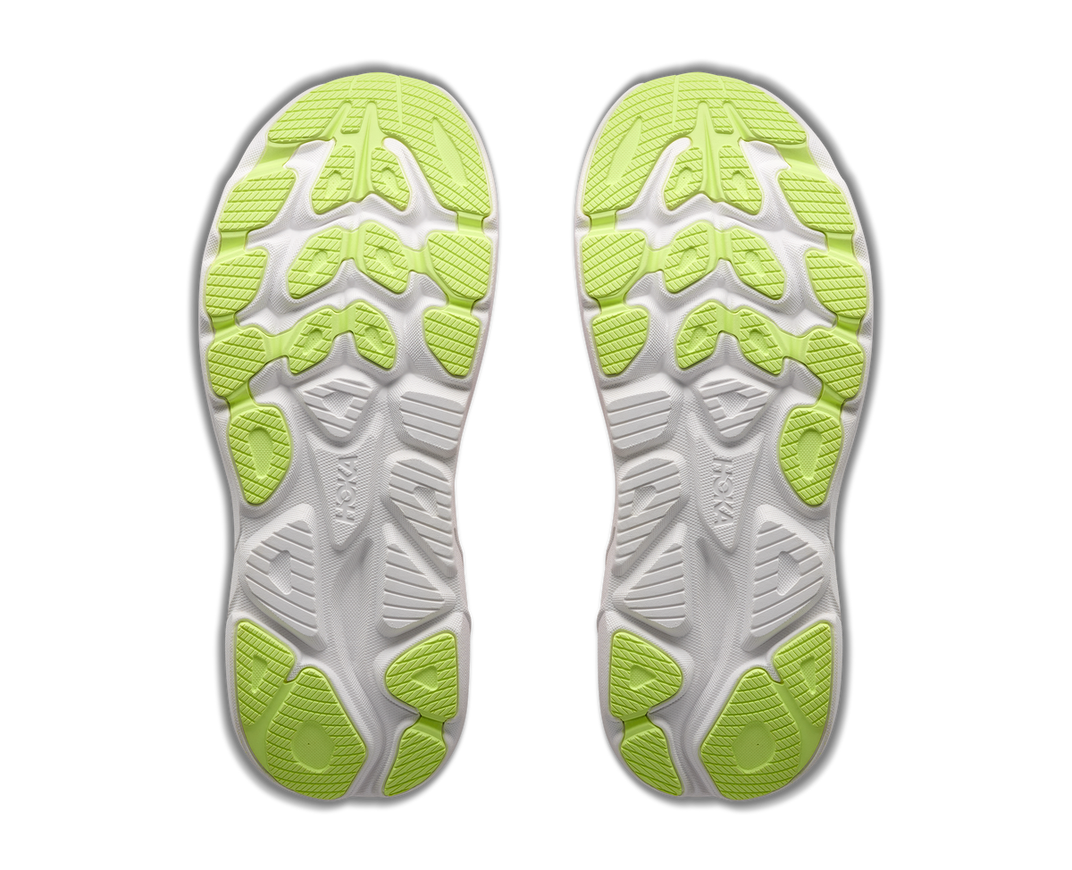 HOKA Clifton 11 outsole view showing white and lime green rubber traction pattern pair