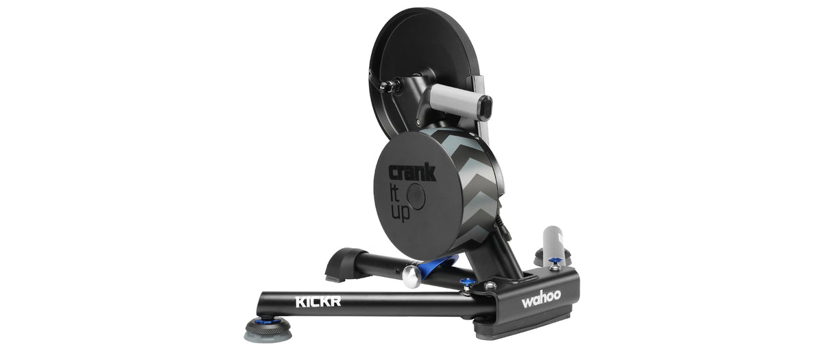 Wahoo KICKR trainer angled view with crank it up text on flywheel promotional image