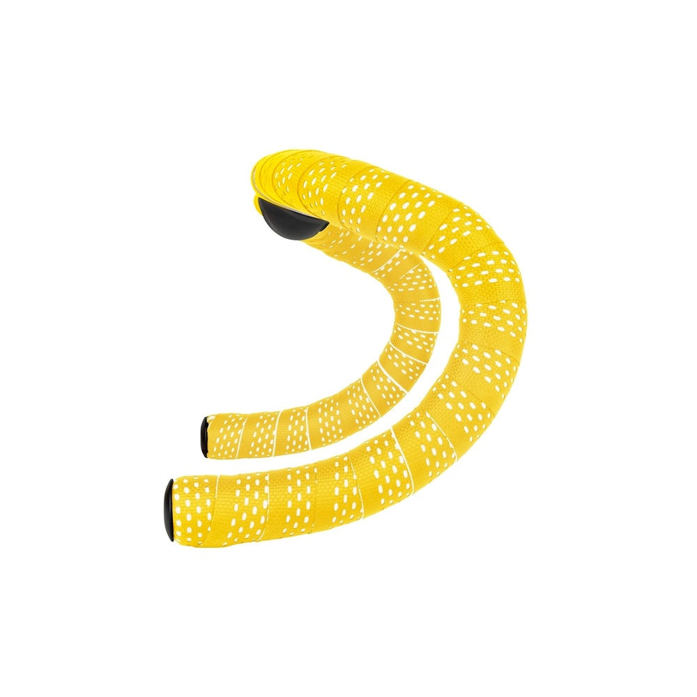 Yellow bicycle bar tape with white polka dot pattern coiled in S-shape