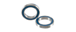 Two CeramicSpeed bottom bracket bearings with blue seals on white background