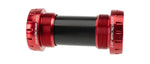 CeramicSpeed red anodized bottom bracket with threaded cups and black center spindle tube