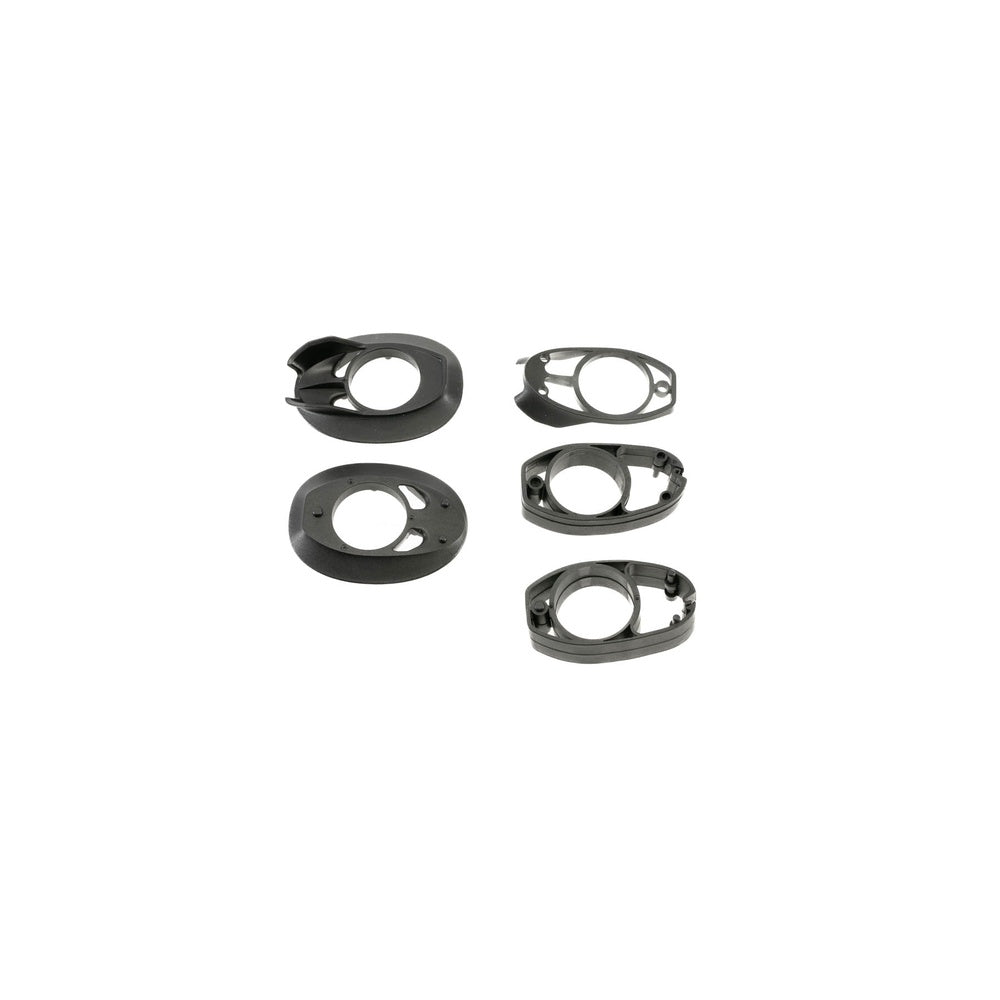 Black Specialized bicycle headset spacers and top cover components arranged on white background