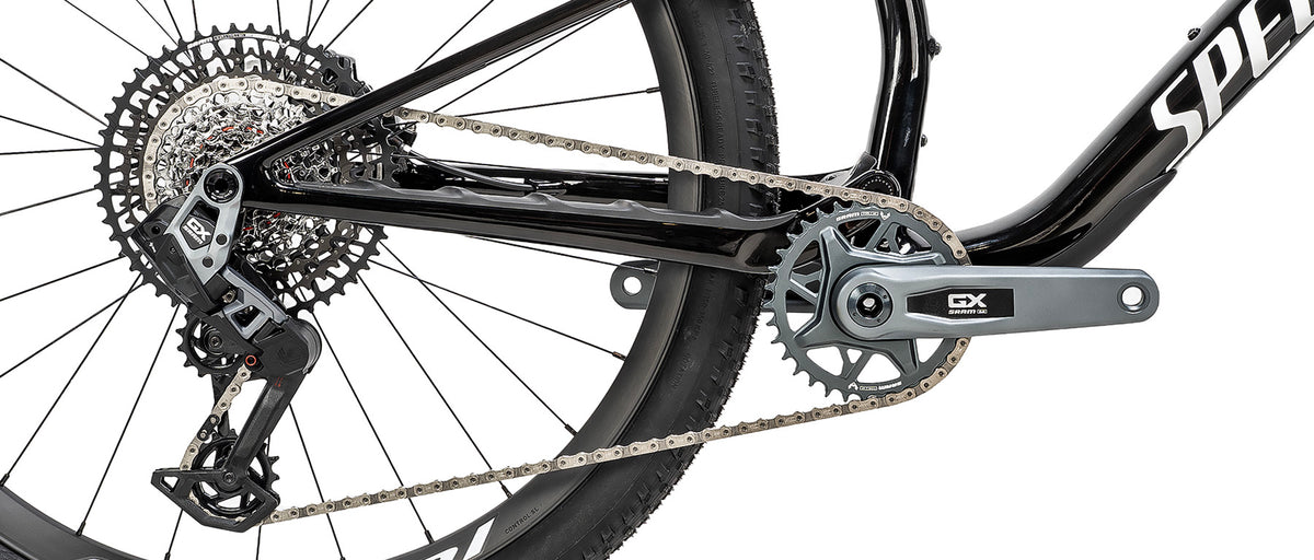 Specialized Epic 9 Expert drivetrain detail showing SRAM GX crankset and rear derailleur on gloss carbon frame
