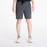 On Performance Hybrid Shorts in shadow gray worn by model on white background