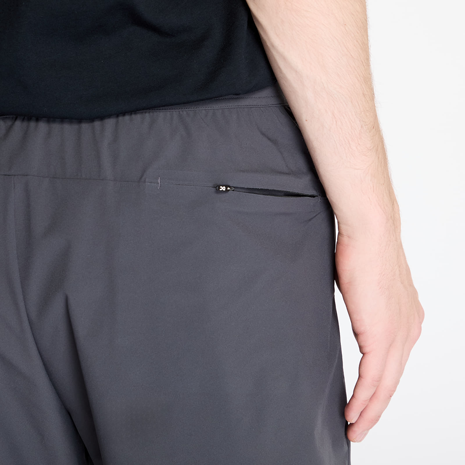 On Performance Hybrid Short Men's in Shadow color showing zippered back pocket detail