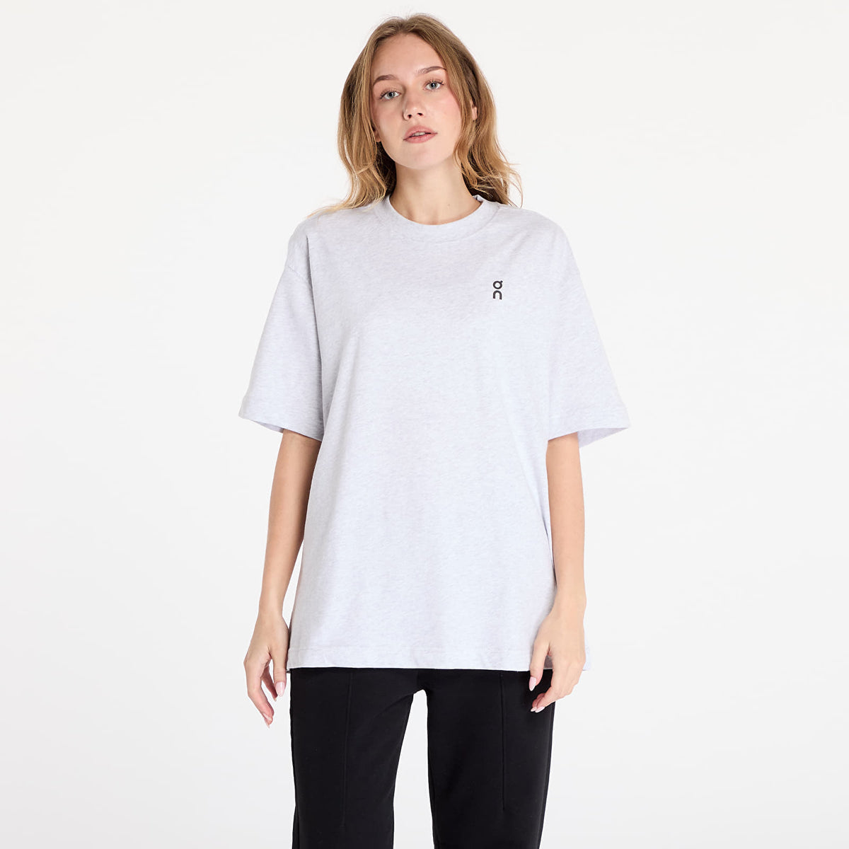 On Running Club-T oversized gray t-shirt worn by female model on white background