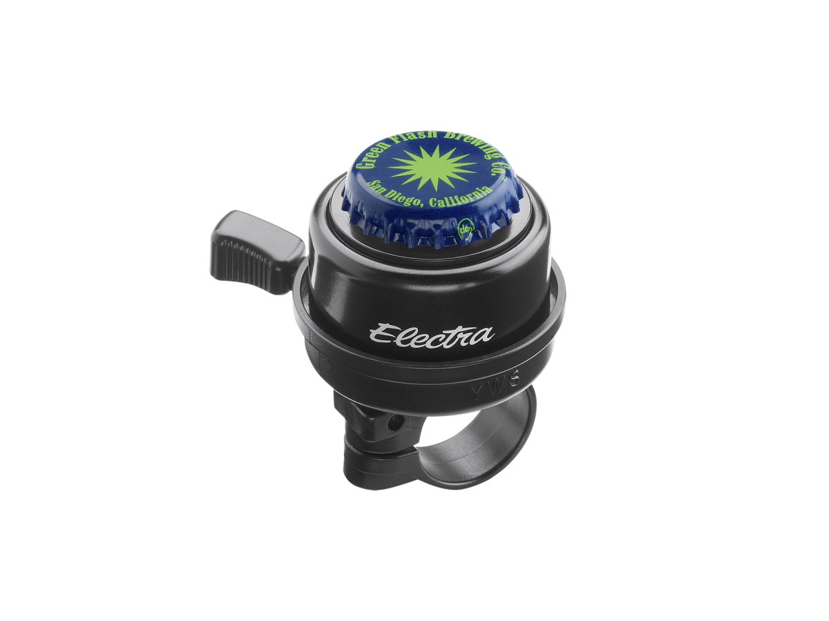 Electra bicycle bell with blue bottle cap design featuring green star pattern