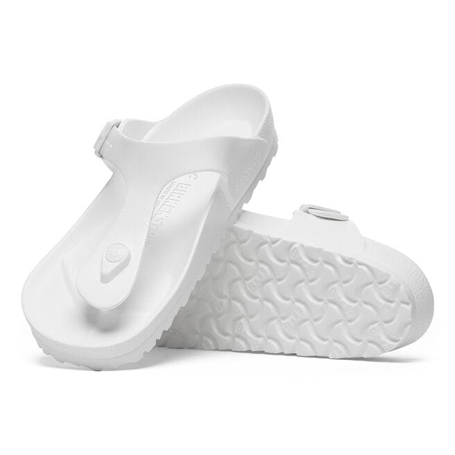 White Birkenstock Gizeh EVA sandals showing top and sole view on clean background