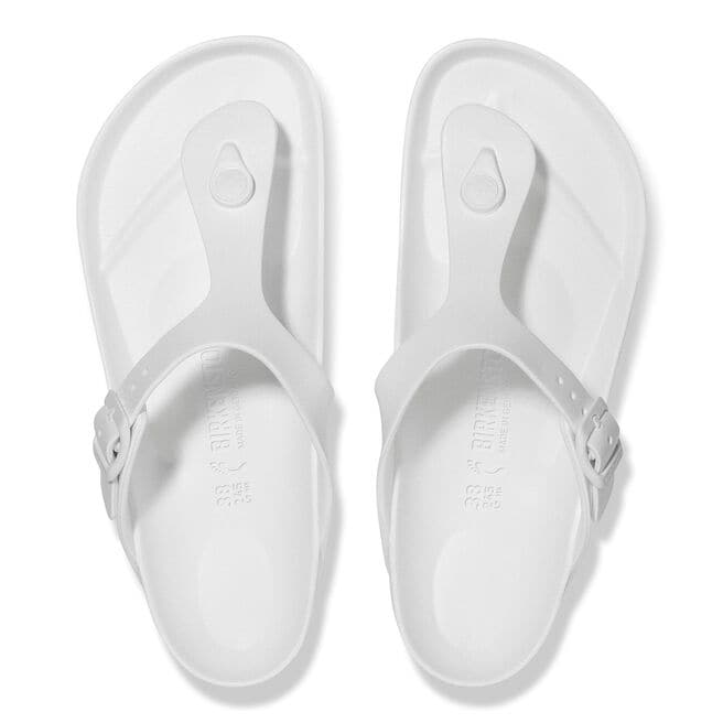 White Birkenstock Gizeh EVA sandals with thong straps and buckles