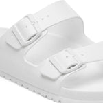 White Birkenstock Arizona Essentials EVA sandals with two adjustable straps and buckles