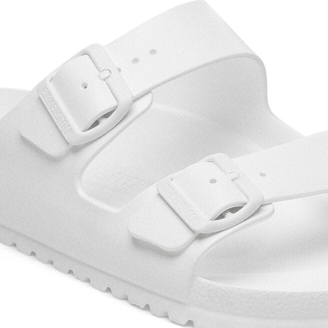 White Birkenstock Arizona Essentials EVA sandals with two adjustable straps and buckles