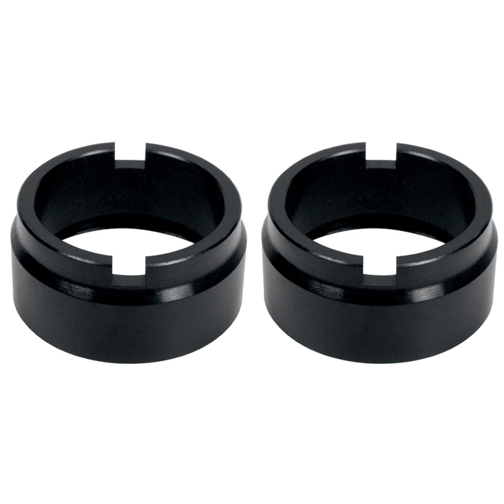 Two black Mavic front axle adapters with cylindrical design and central slots