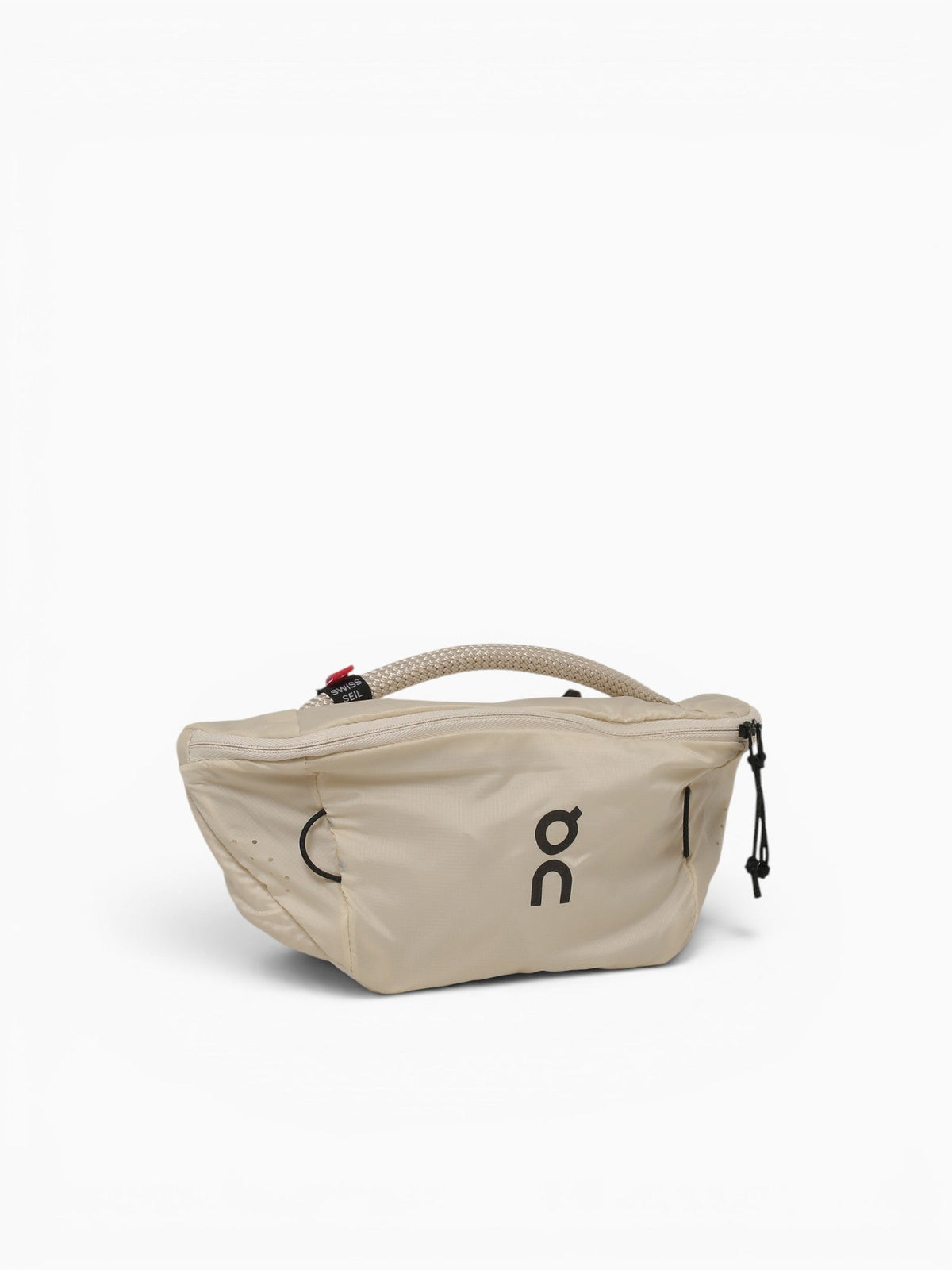 On Waist Pack 2L Lite in cream sand color with rope handle and zipper closure