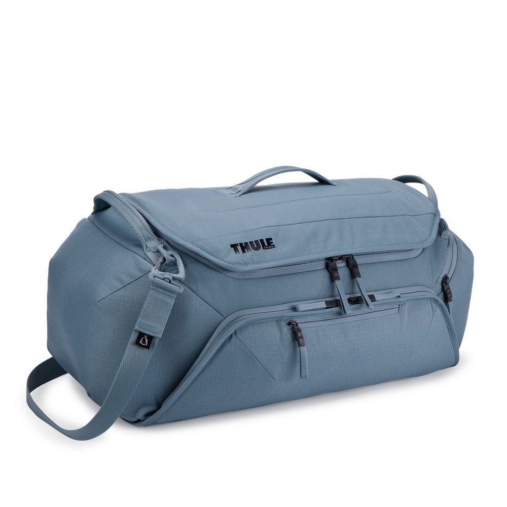 Thule Roundtrip Bike Duffel 55L in mid blue with shoulder strap and handles