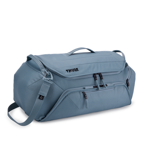 Thule Roundtrip bike duffel bag in mid blue with shoulder strap and handles