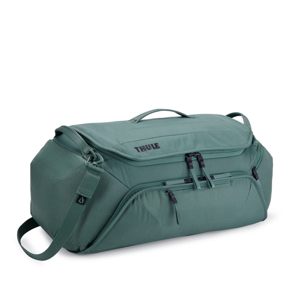 Thule Roundtrip Bike Duffel 55L in hazy green with multiple compartments and straps