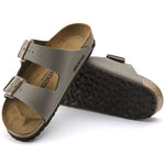 Birkenstock Arizona sandals in stone gray with dual buckle straps and cork footbed