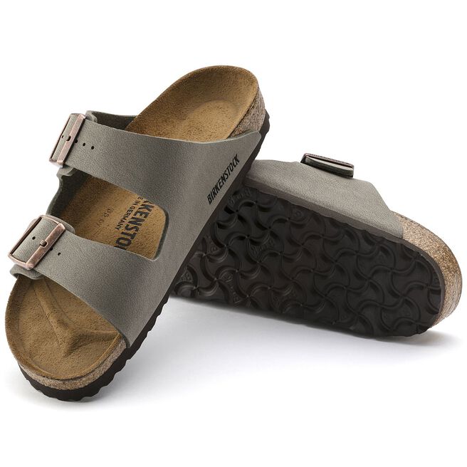 Birkenstock Arizona sandals in stone gray with dual buckle straps and cork footbed