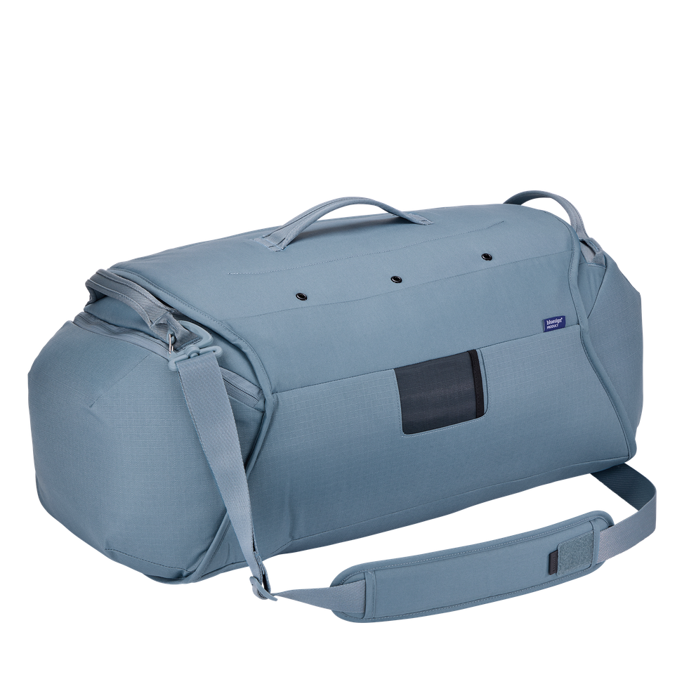 Thule Roundtrip bike duffel bag in mid blue with shoulder strap