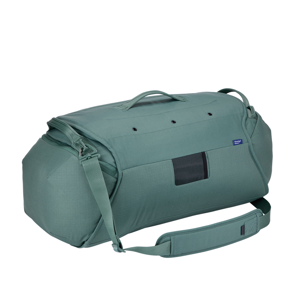 Thule Roundtrip bike duffel bag in hazy green with shoulder strap