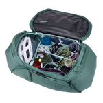 Thule Roundtrip bike duffel bag open showing organized compartments with helmet and clothes